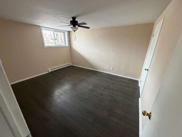 4 1/2 sous-sol a louer , calme paisible, accès terrain